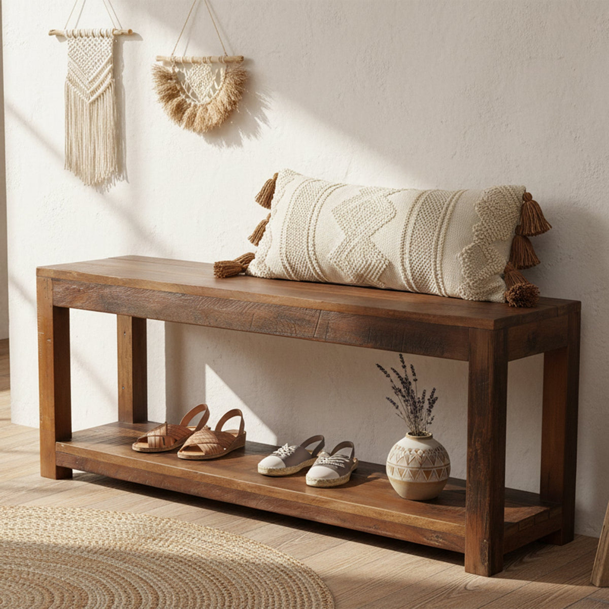 Kayu Living Factory industrial entryway bench in brown reclaimed wood with a lower shoe shelf and decorative pillow.