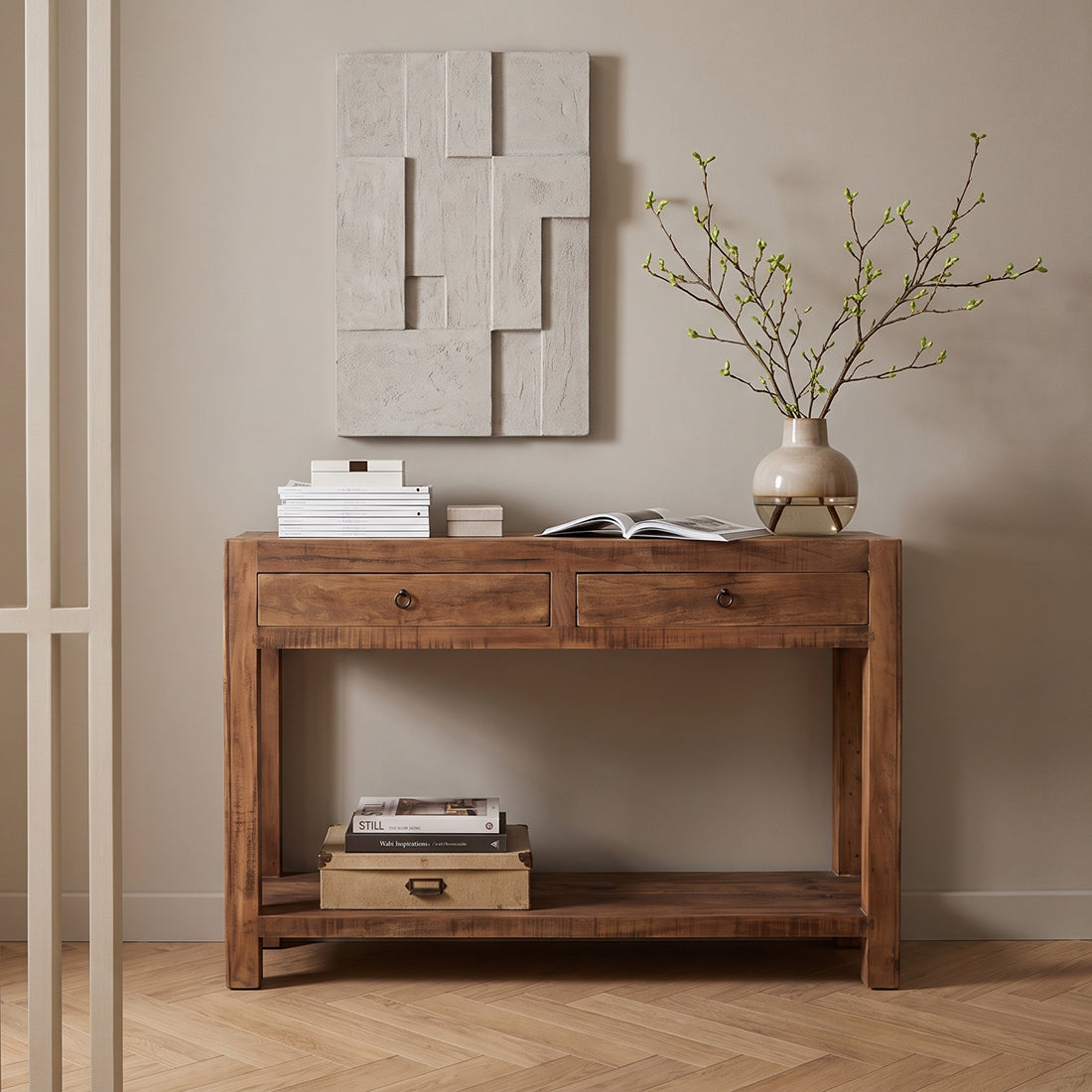 Kayu Living Farmwood reclaimed wooden side table with two drawers and a lower shelf in a minimalist living room.