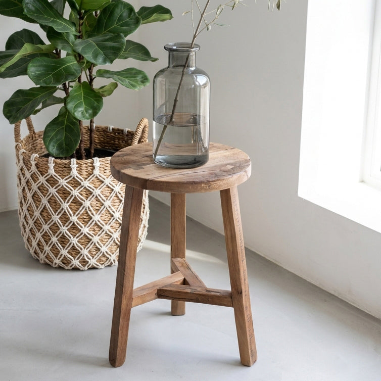 Kayu Living Farmwood round wooden stool made from reclaimed FSC-certified wood with a rustic brown finish.
