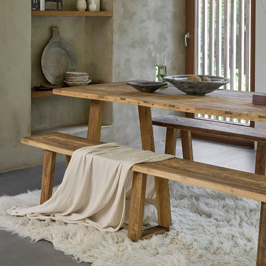 Kayu Living Farmwood dining table and bench set made from recycled brown wood with natural grain and knots.