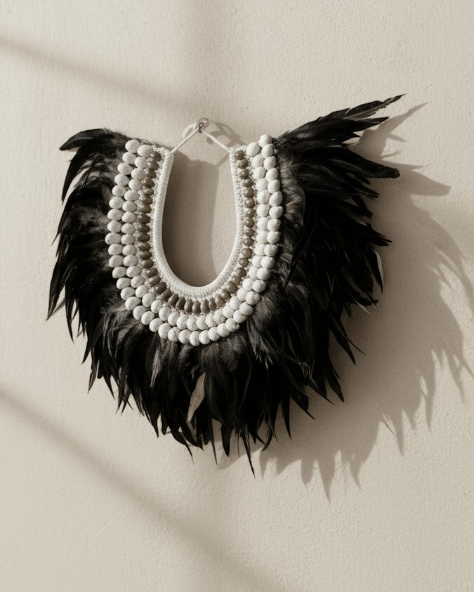 Kayu Living Charcoal Ivory feather necklace with white beads, handcrafted in Bali for bohemian decor.