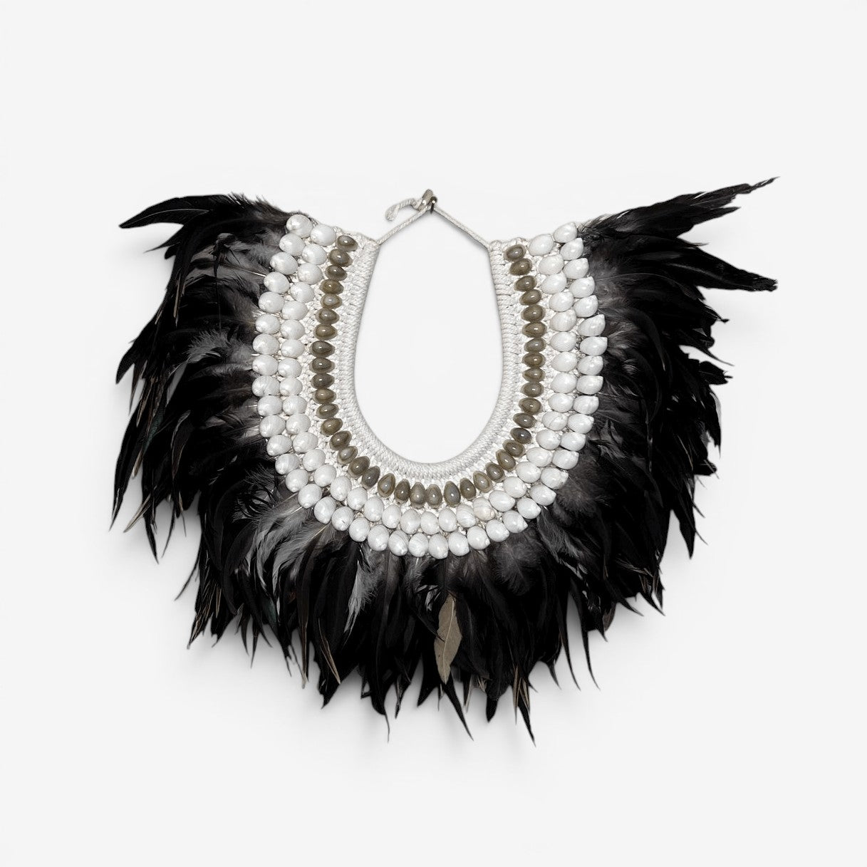 Kayu Living Charcoal Ivory feather necklace with white and grey shell accents, handcrafted in Bali.