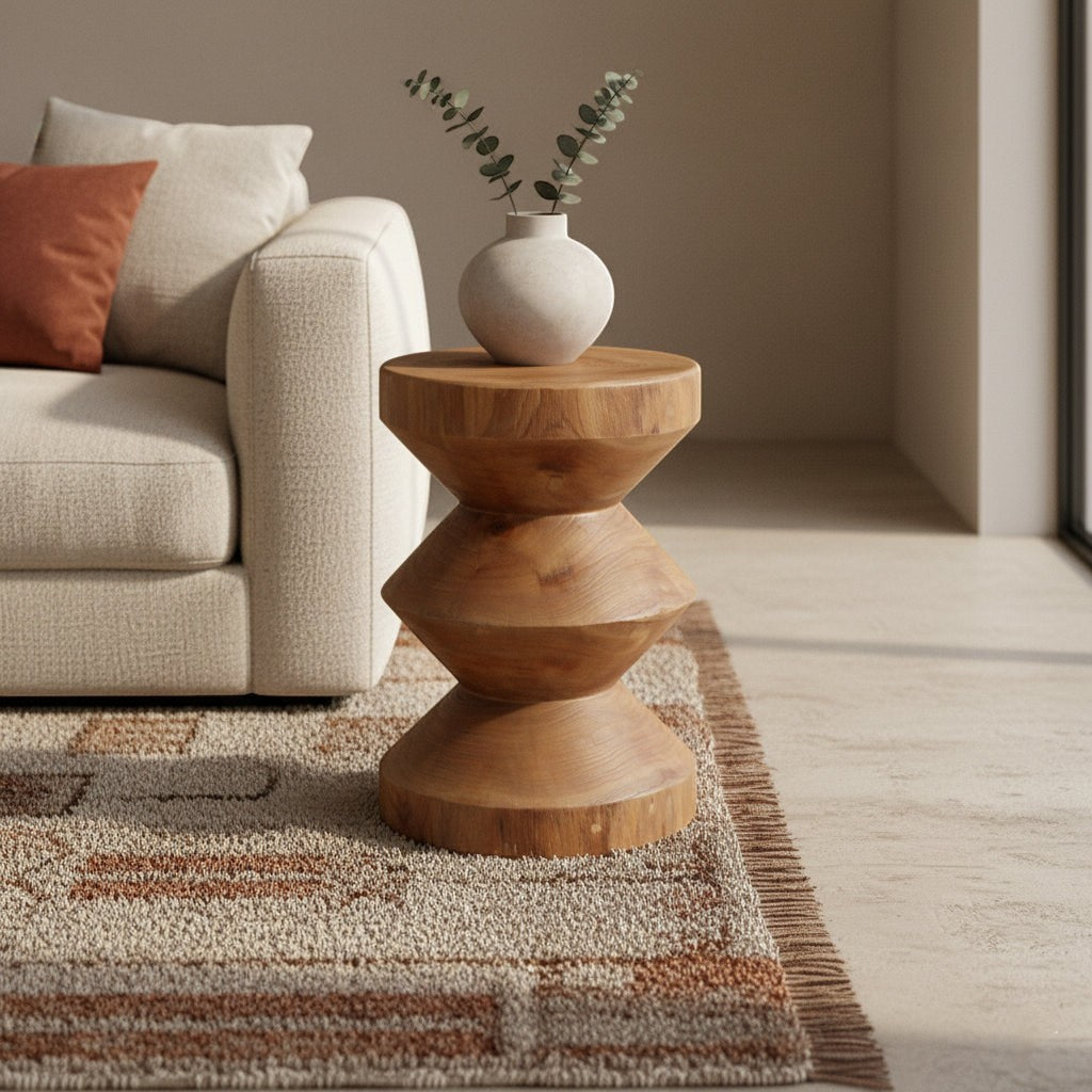 Kayu Living Forma teak side table with a stacked geometric design, displayed in a warm, minimalist living room.