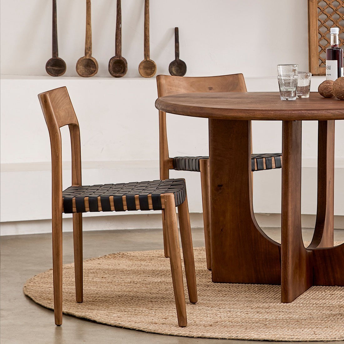 Kayu Living Freya dining chair with black woven leather seat and natural wood frame. Set of 2.