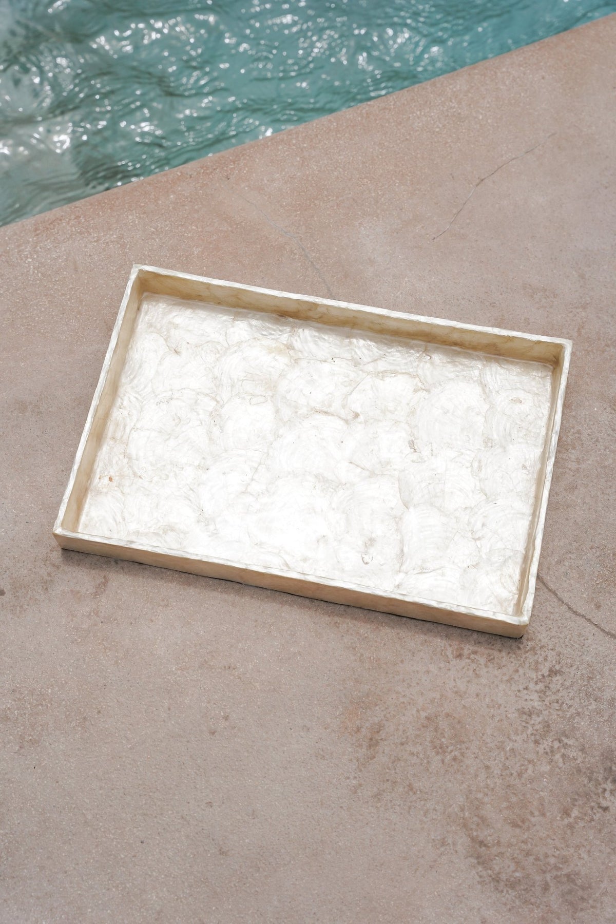 Kayu Living rectangular gold Capiz shell decorative tray with a lustrous, handmade finish for home decor.