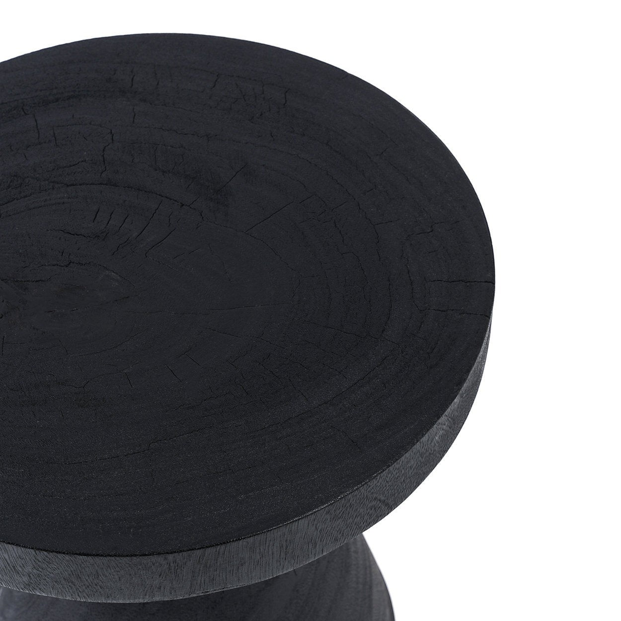 Kayu Living Gravity Side Table in black suar wood with a smooth, modern finish and visible natural wood grain.