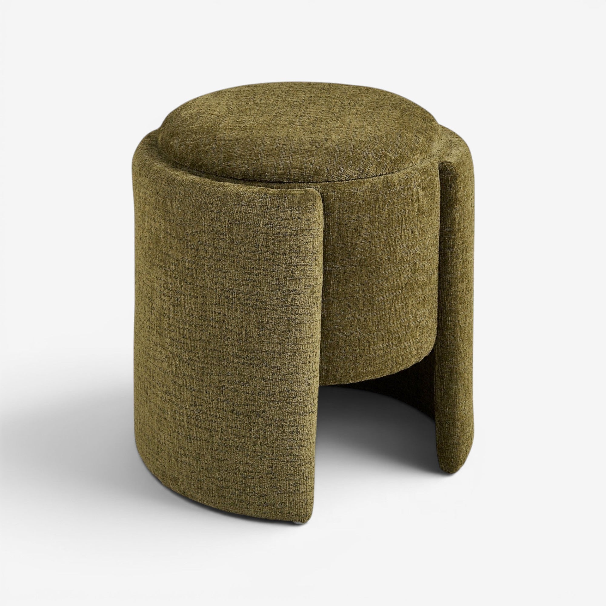 Kayu Living green round pouf upholstered in textured fabric with a unique curved panel design.