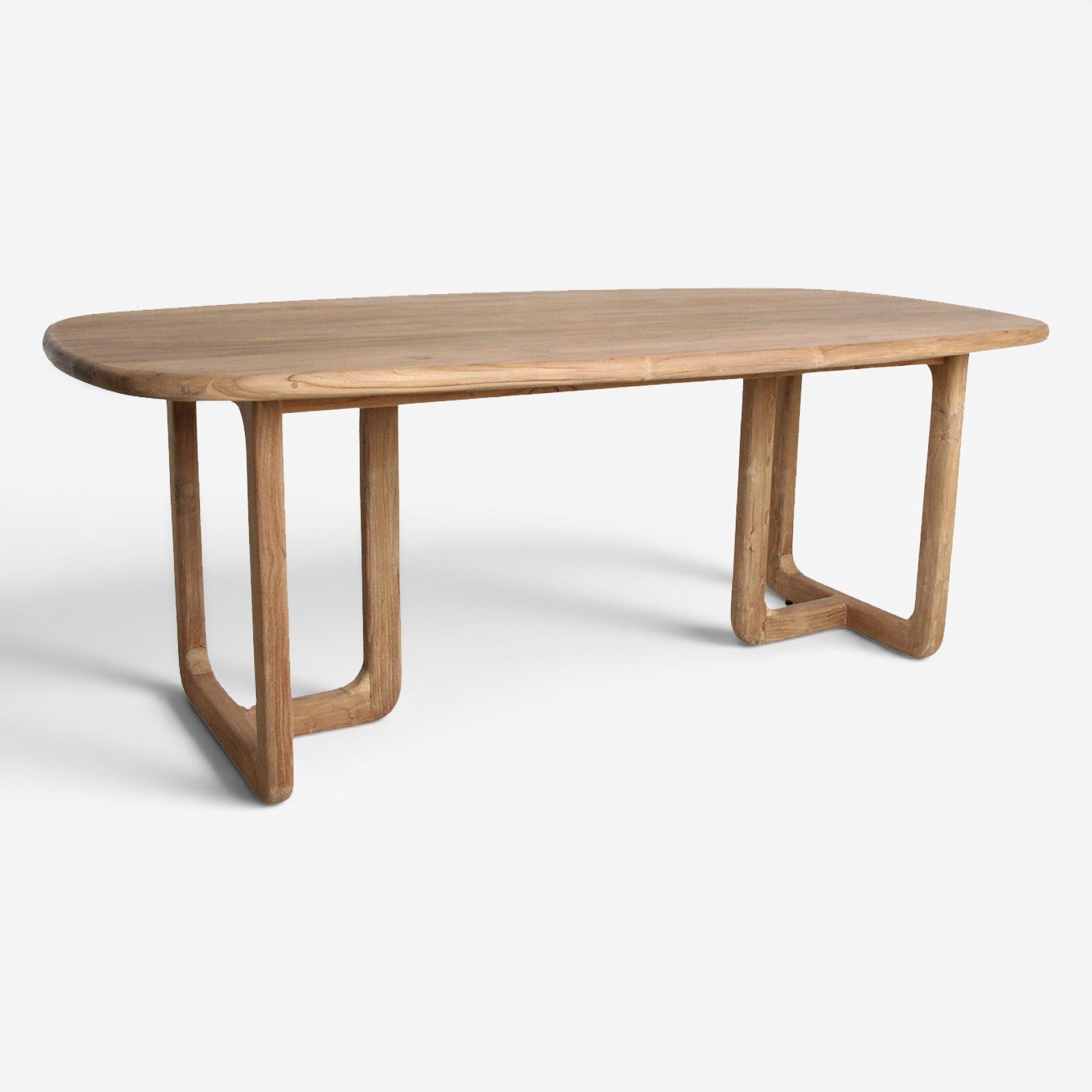 Kayu Living Invierno rectangular dining table in natural recycled teak wood with rounded corners and organic base.