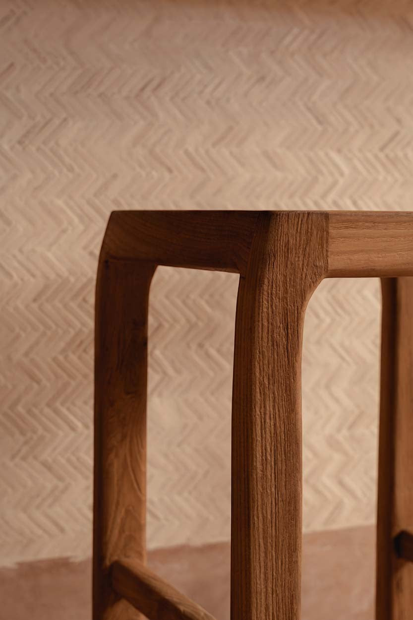 Kayu Living Ithaca bar stool made of sustainable recycled teak with a natural wood finish and durable design.