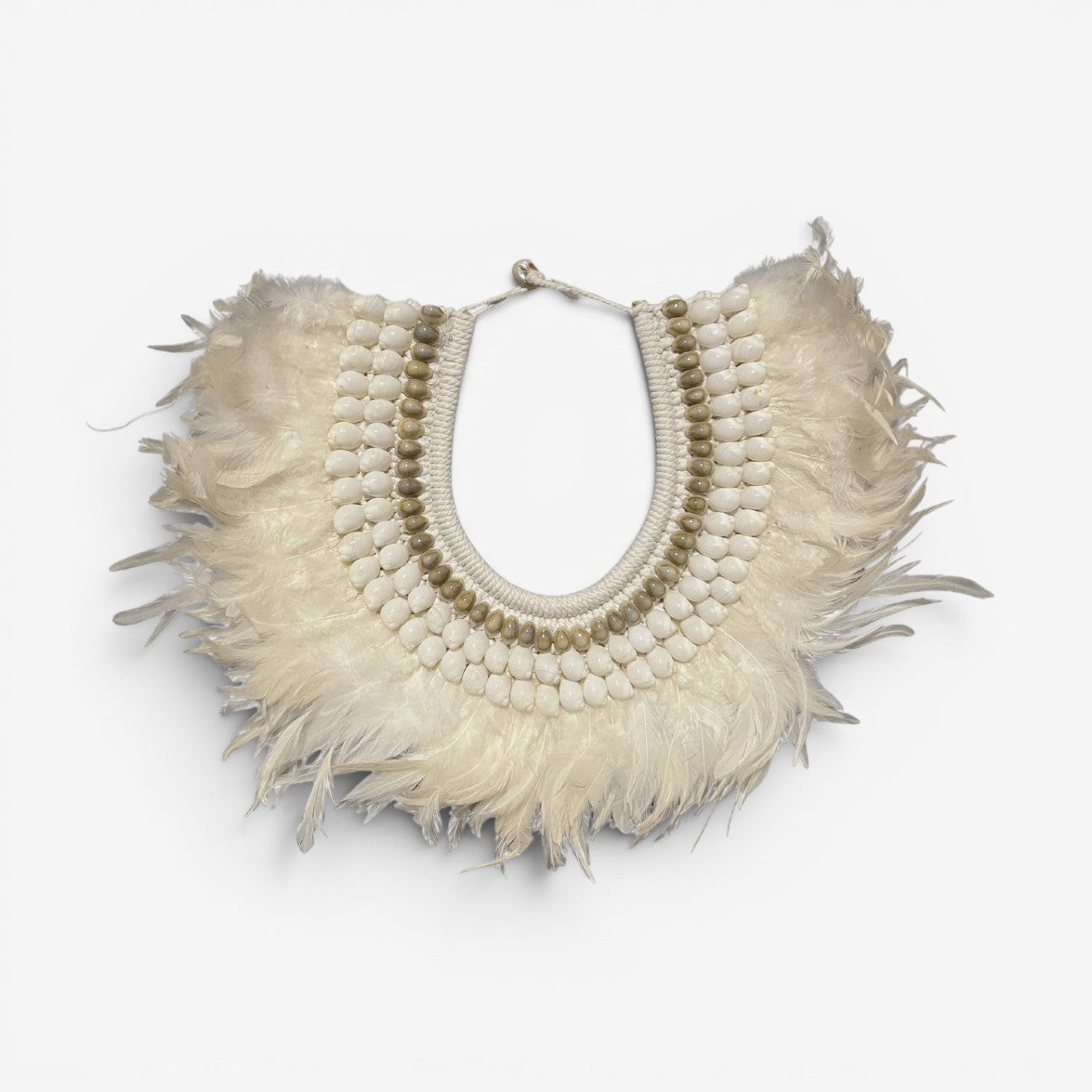 Kayu Living ivory white feather necklace with natural shells, handcrafted in Bali, bohemian style.