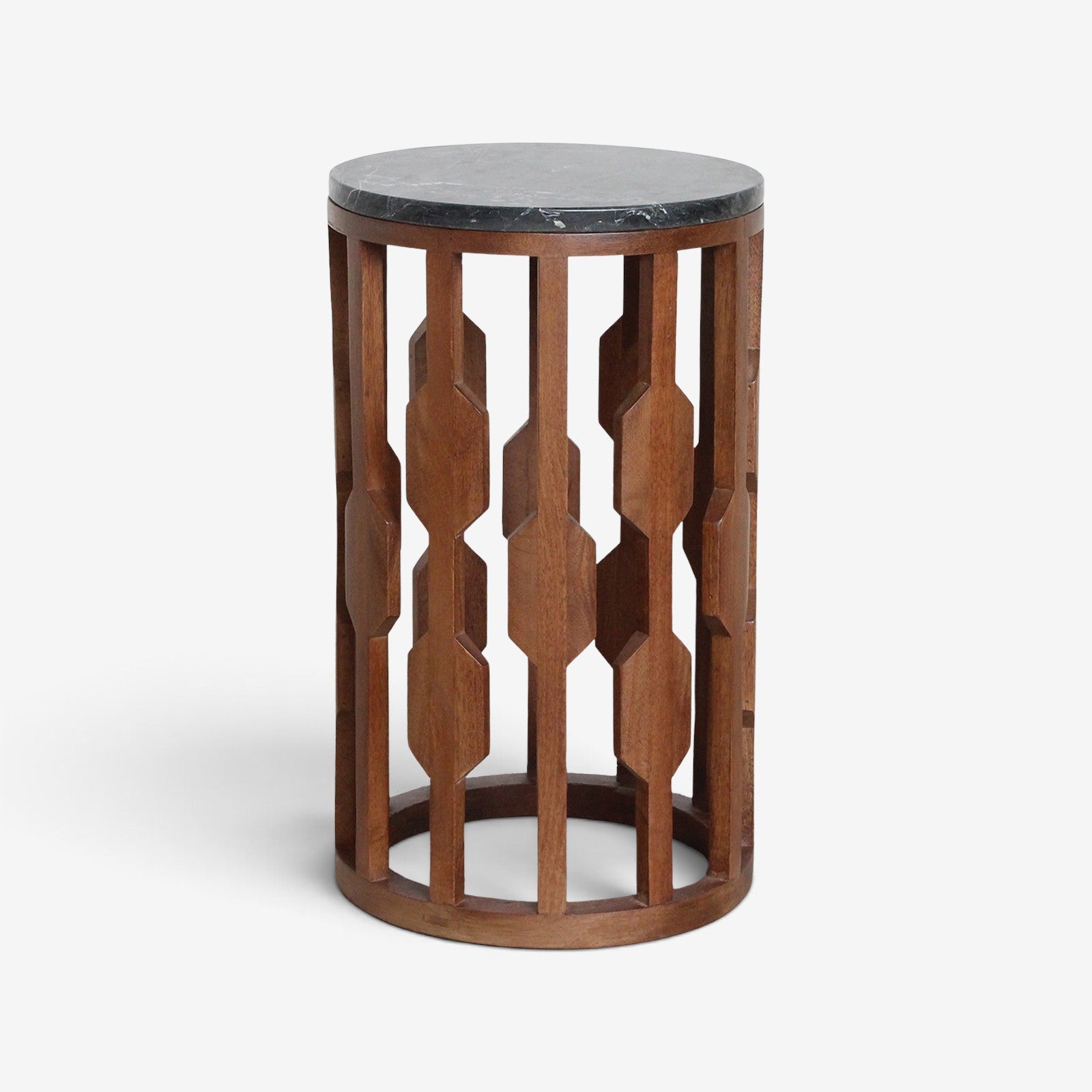 Kayu Living Lampung round side table with a black marble top and a decorative dark mango wood base.