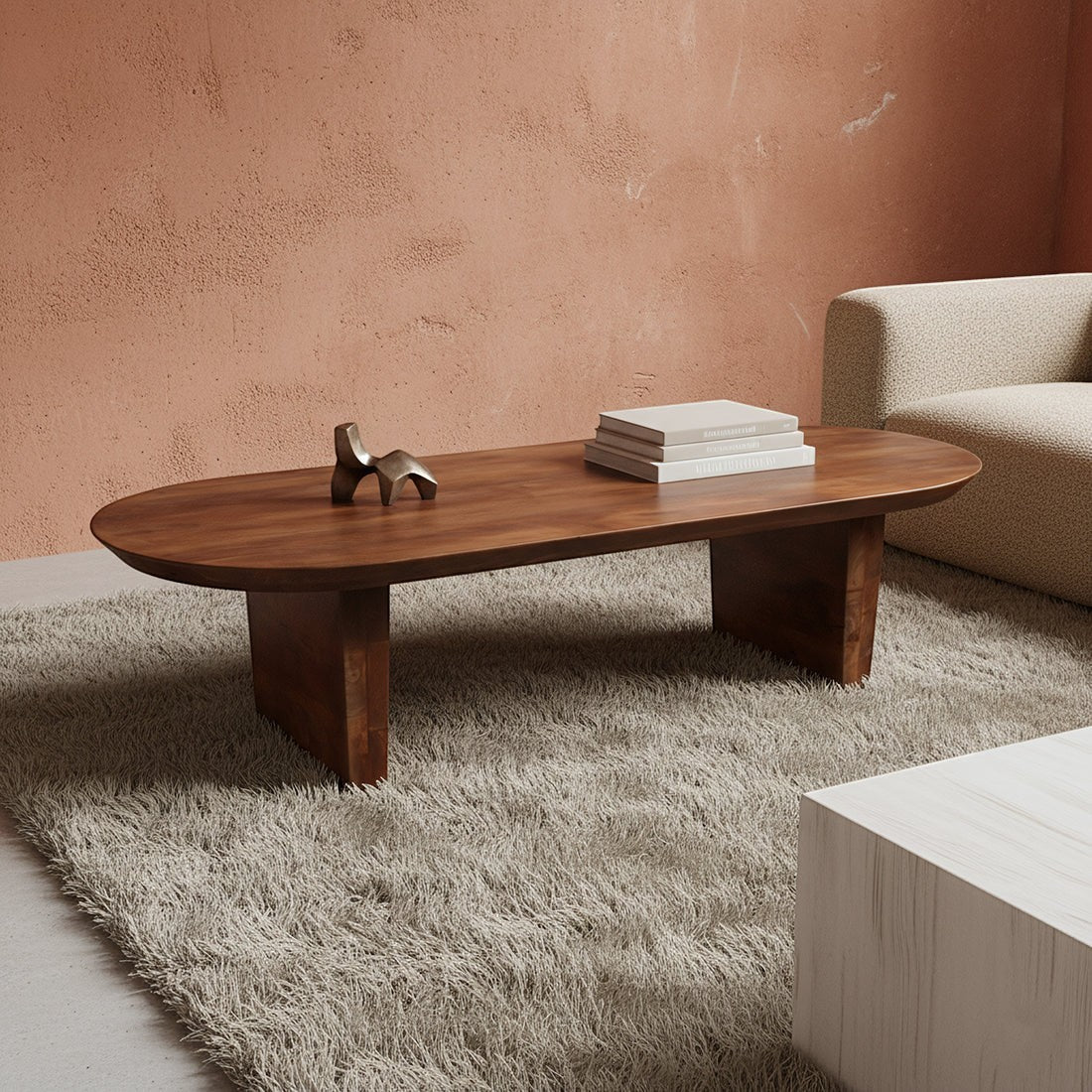 Kayu Living brown mango wood coffee table with a bullnose edge in a modern living room setting.