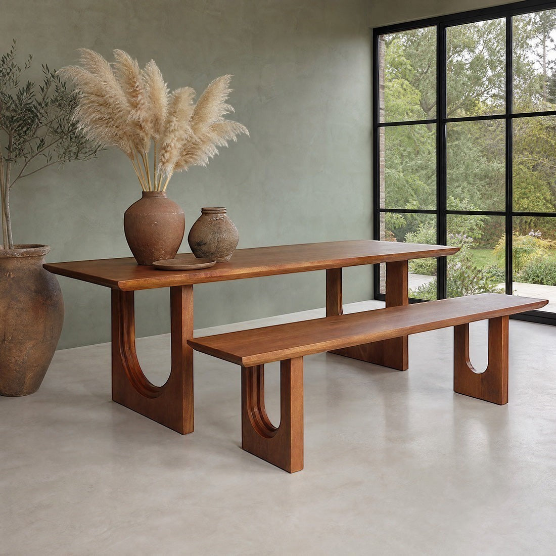 Kayu Living 180cm mango wood dining bench with bullnose chamfered edges in a modern minimalist dining room setting.