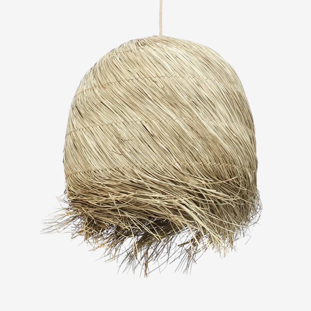 Kayu Living natural mendong grass pendant lamp with fringed hem, bringing an earthy, cozy vibe.