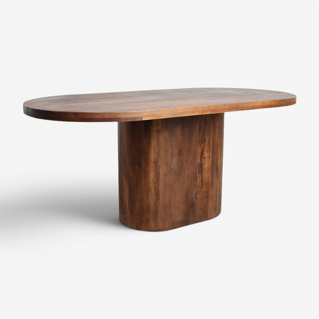 Kayu Living bullnose oblong oval dining table in solid mango wood with a sturdy central pedestal base.