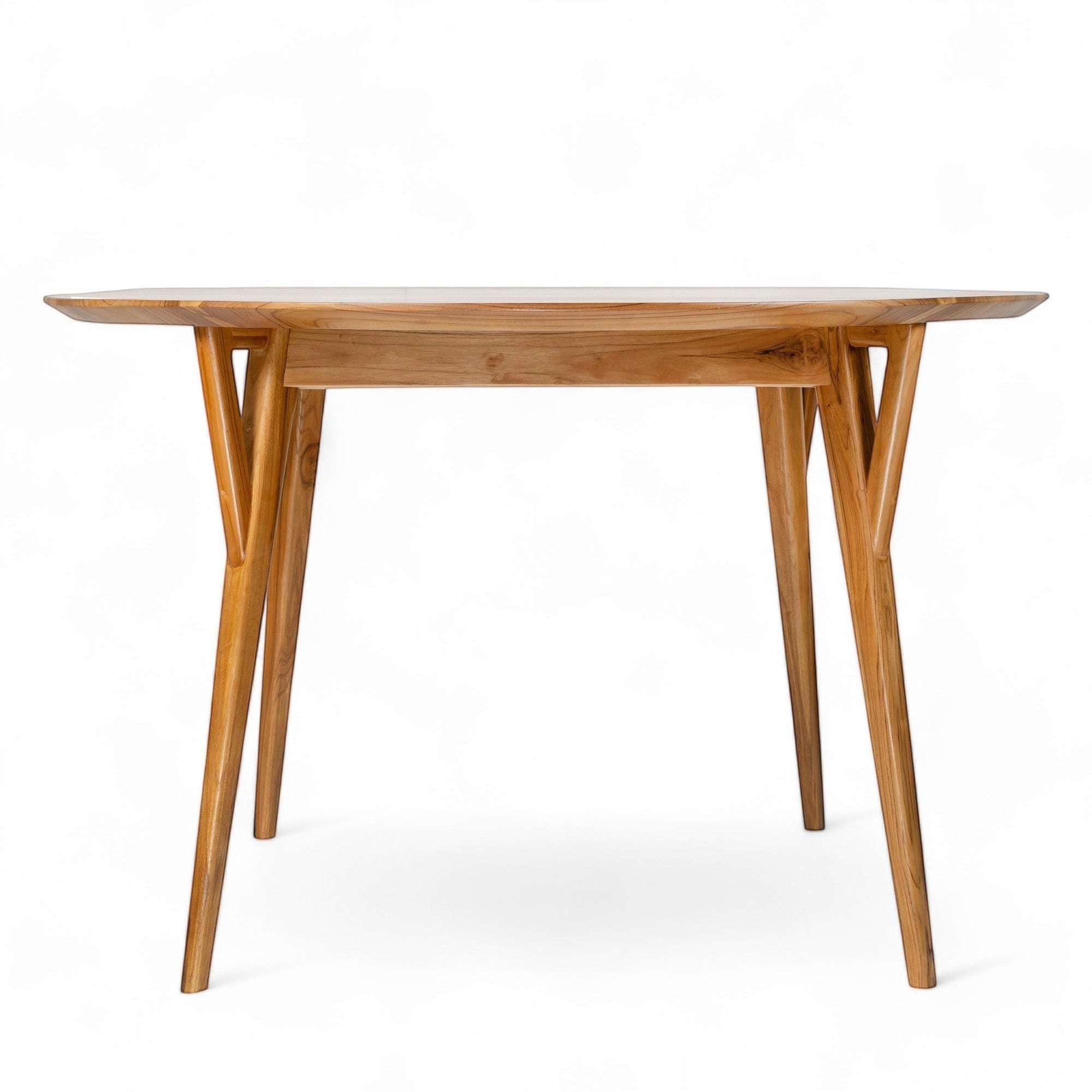 Kayu Living Pantai 120 cm round teak dining table with unique grain patterns and warm earthy tones.
