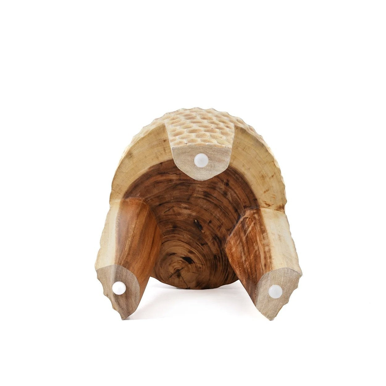 Kayu Living Paramo Stool handcrafted from natural suar wood with three sturdy legs and unique grain patterns.