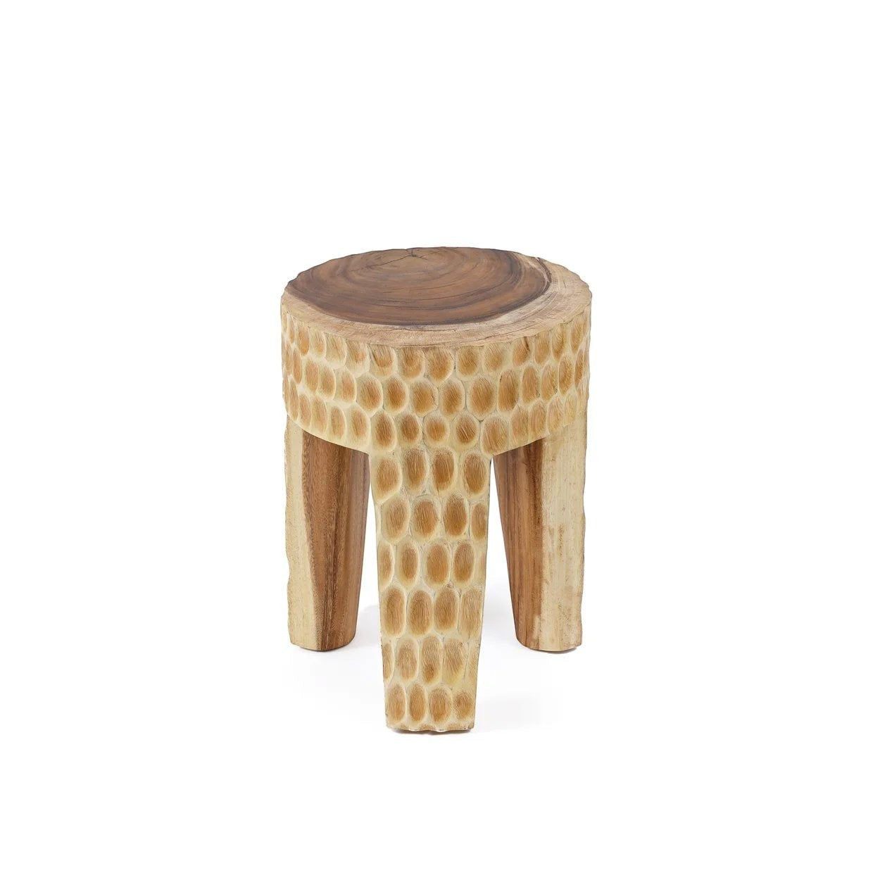 Kayu Living Paramo Stool handcrafted from natural suar wood with a textured carved base and three sturdy legs.
