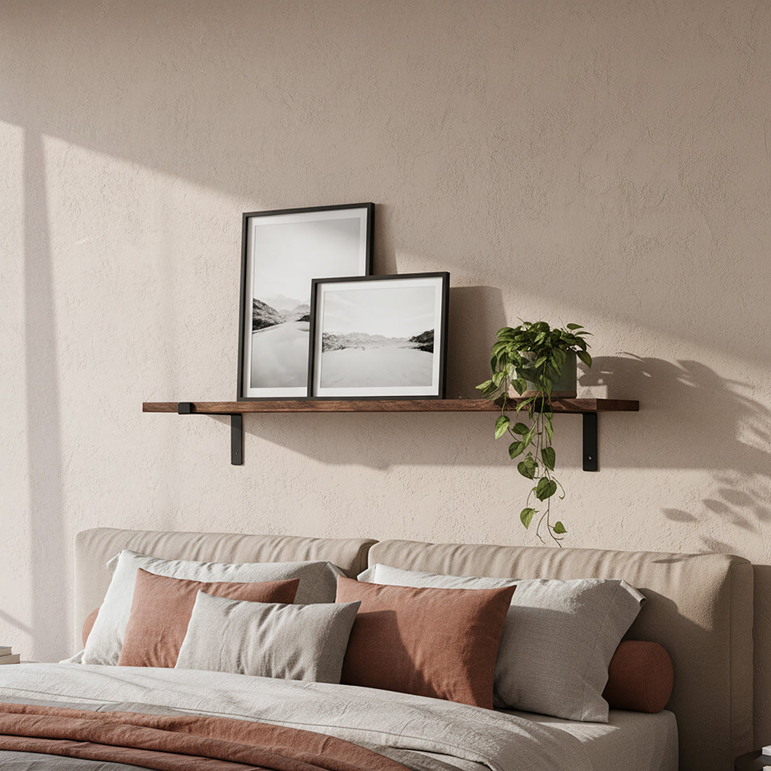Kayu Living Factory wall shelf made of reclaimed FSC recycled wood with black metal brackets above a bed.