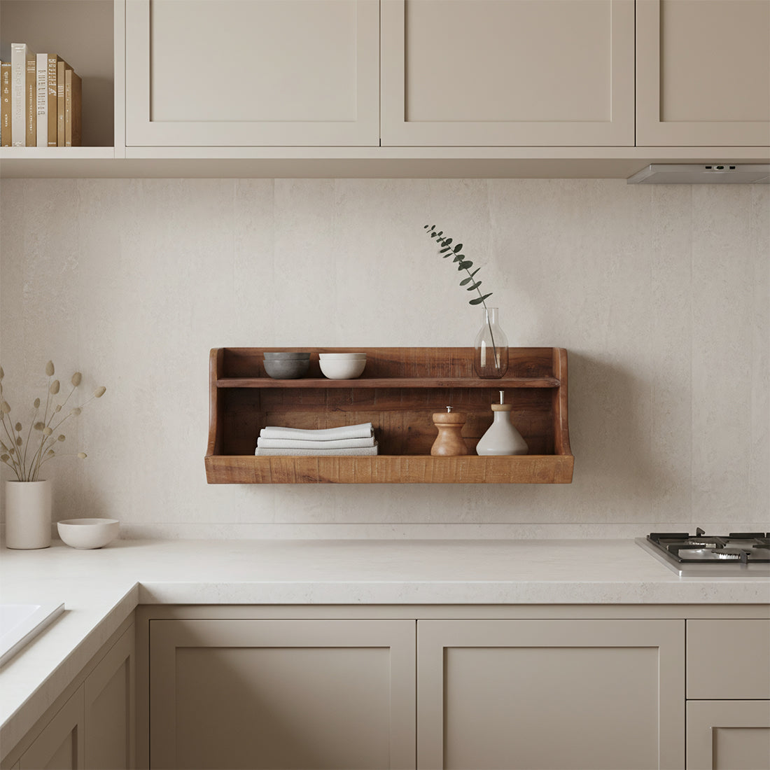 Kayu Living two-tier wall shelf in dark reclaimed wood mounted above a kitchen counter with decorative items.