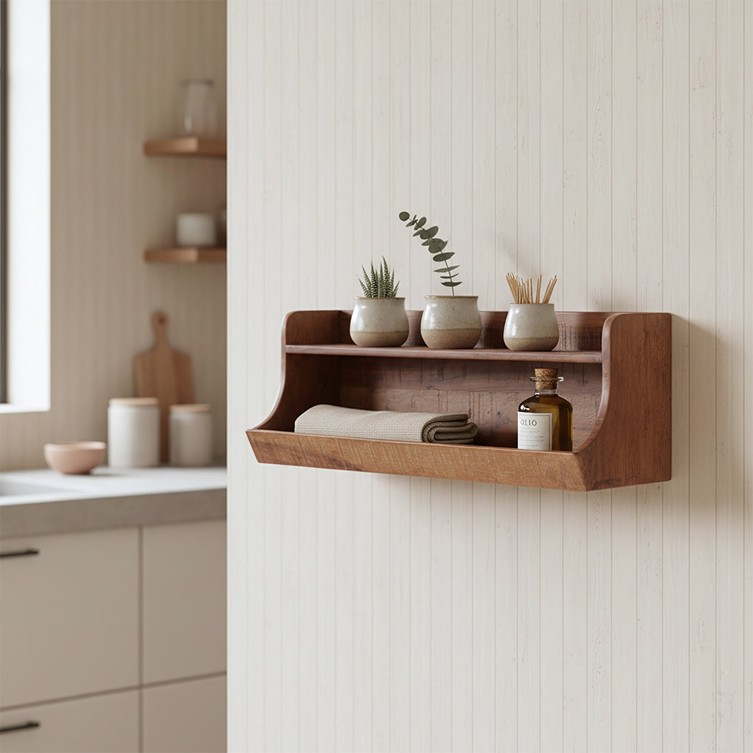 Kayu Living two-tier wall storage shelf made from dark reclaimed FSC-recycled wood, mounted in a bright kitchen.