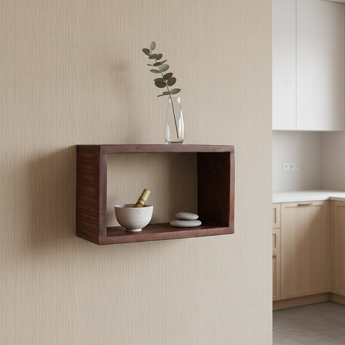 Kayu Living rectangular wall shelf made from FSC recycled wood with warm tones, displaying a vase and small bowl.