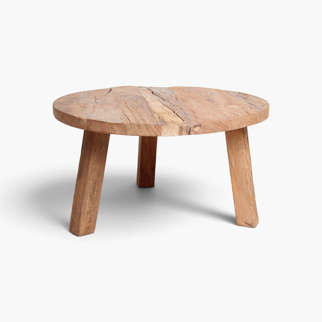 Kayu Living round coffee table made from brown reclaimed FSC-certified wood with natural grain and rustic texture.