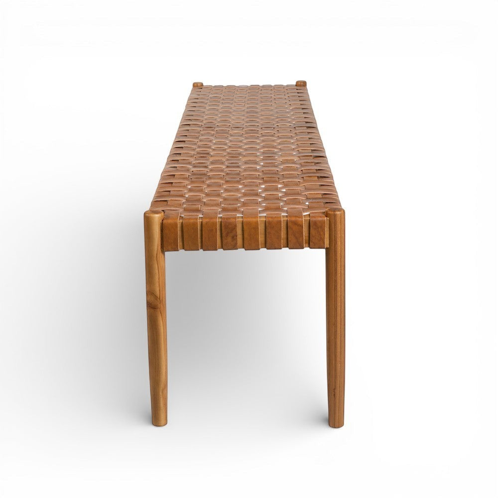 Kayu Living Sanur 180 cm bench with solid teak frame and handwoven camel leather seat. Timeless design for dining, hallway, or bedroom.