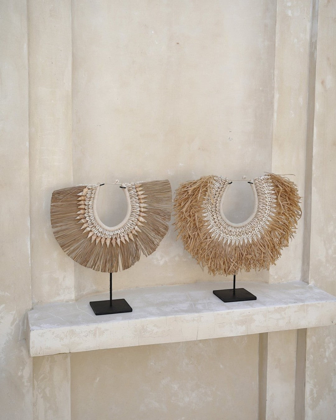 Kayu Living handmade seagrass and shell wall art hangers on black metal stands, neutral bohemian decor