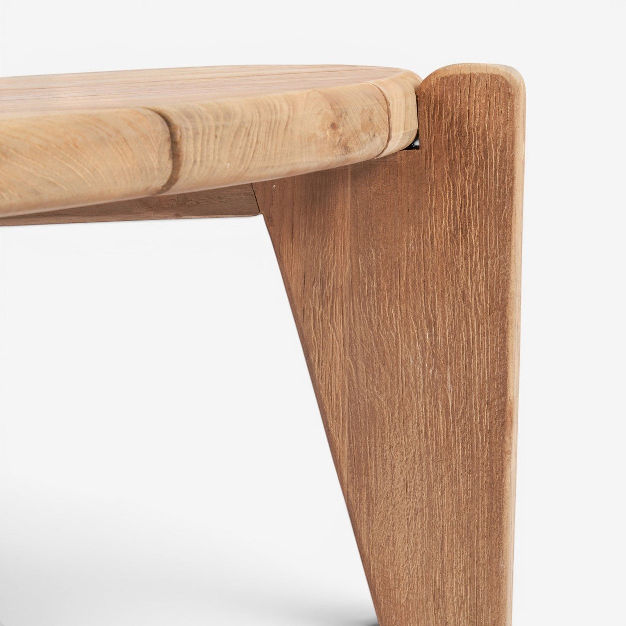 Kayu Living Seseh outdoor coffee table in reclaimed teak with a three-leg silhouette and natural grain.