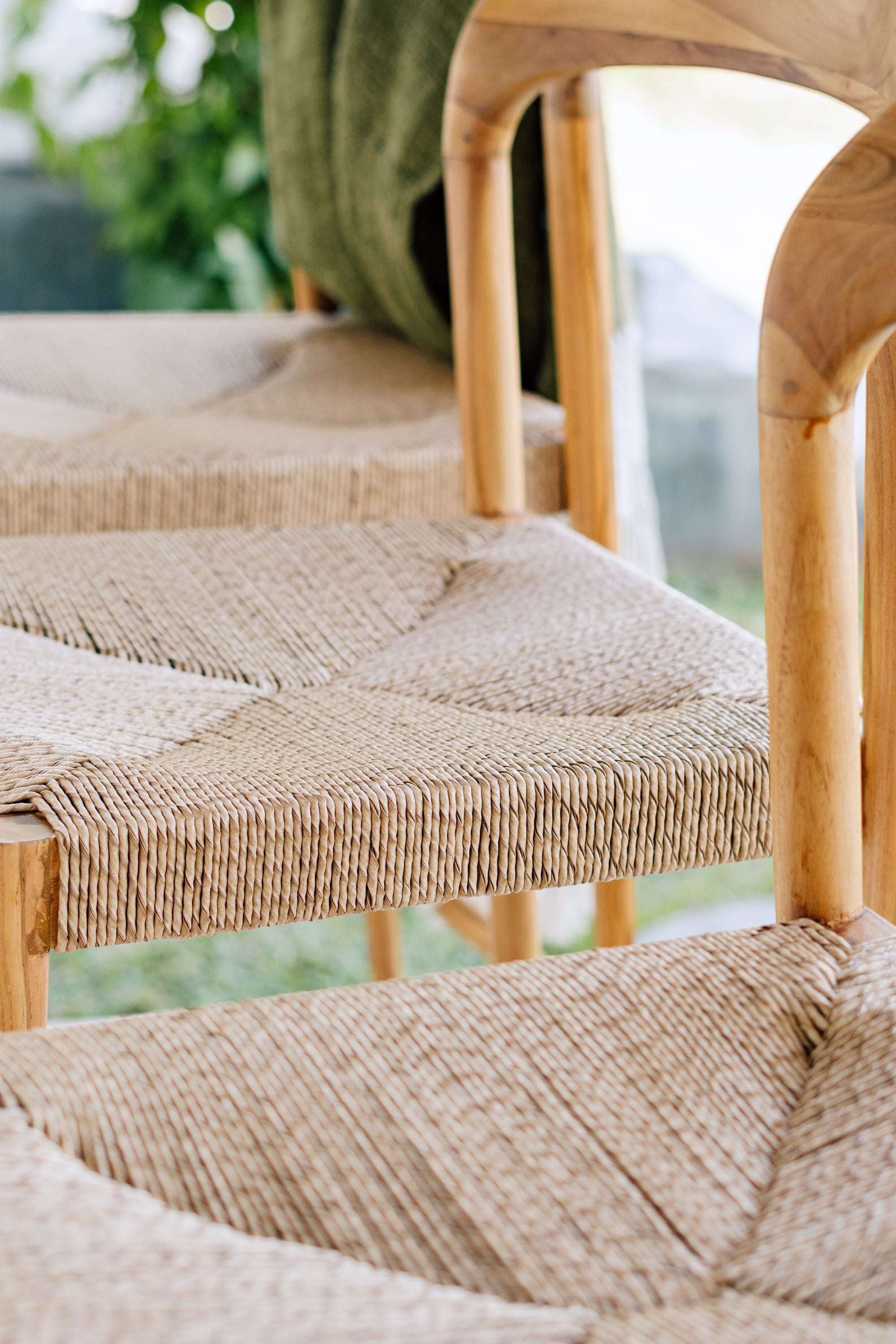 Kayu Living Cemagi counter stool with natural woven rope seat and teak frame, suitable for indoor/outdoor use.