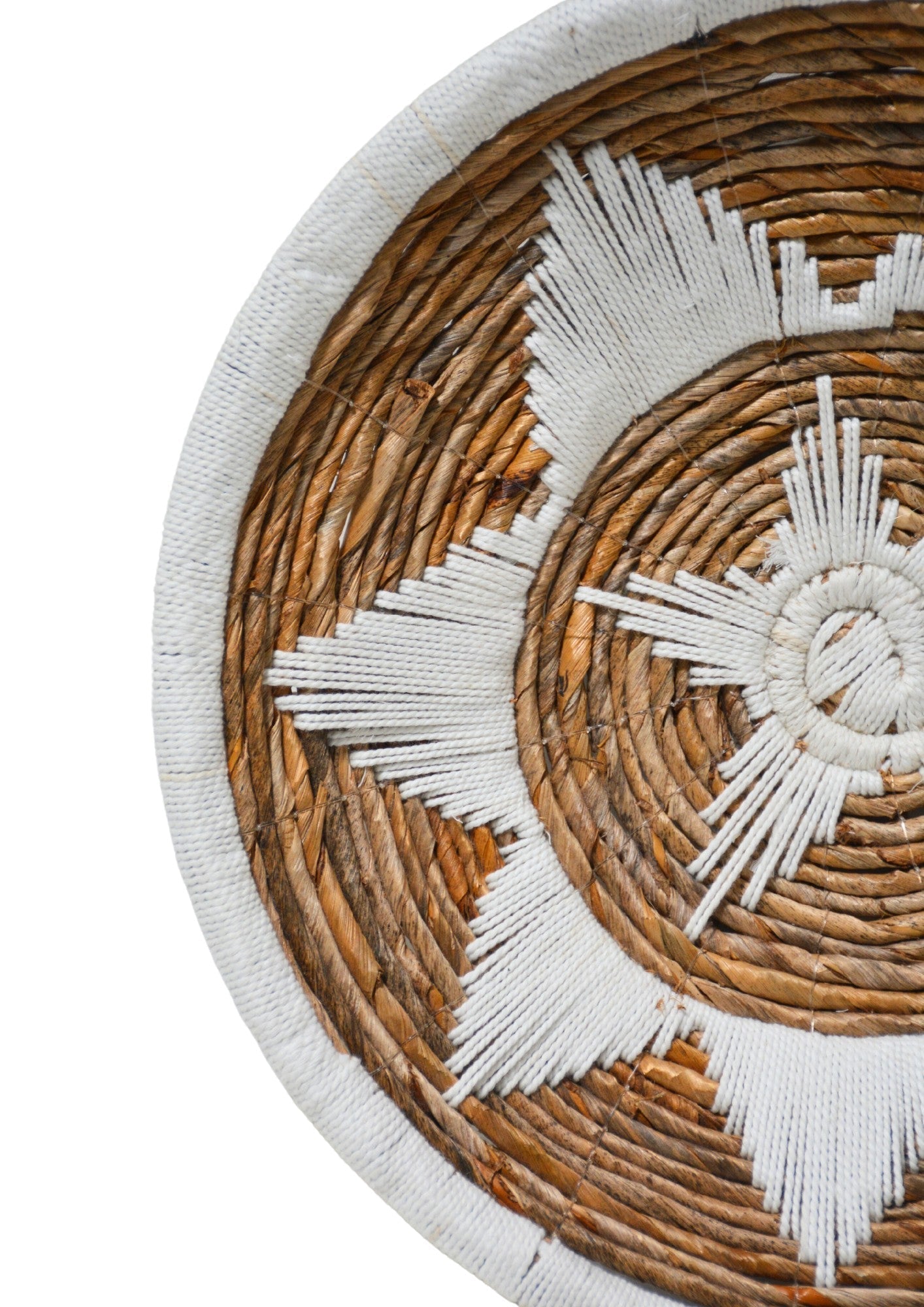 Kayu Living Uluwatu medium wall basket in brown banana leaf and white cotton with a bohemian geometric pattern.