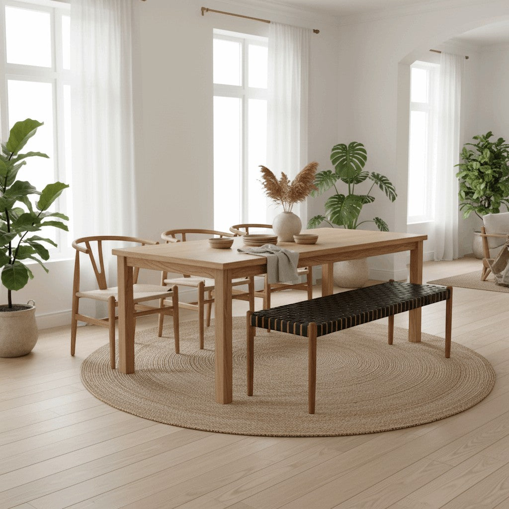 Kayu Living Umalas 180cm bench with solid teak frame and handwoven black leather seat.