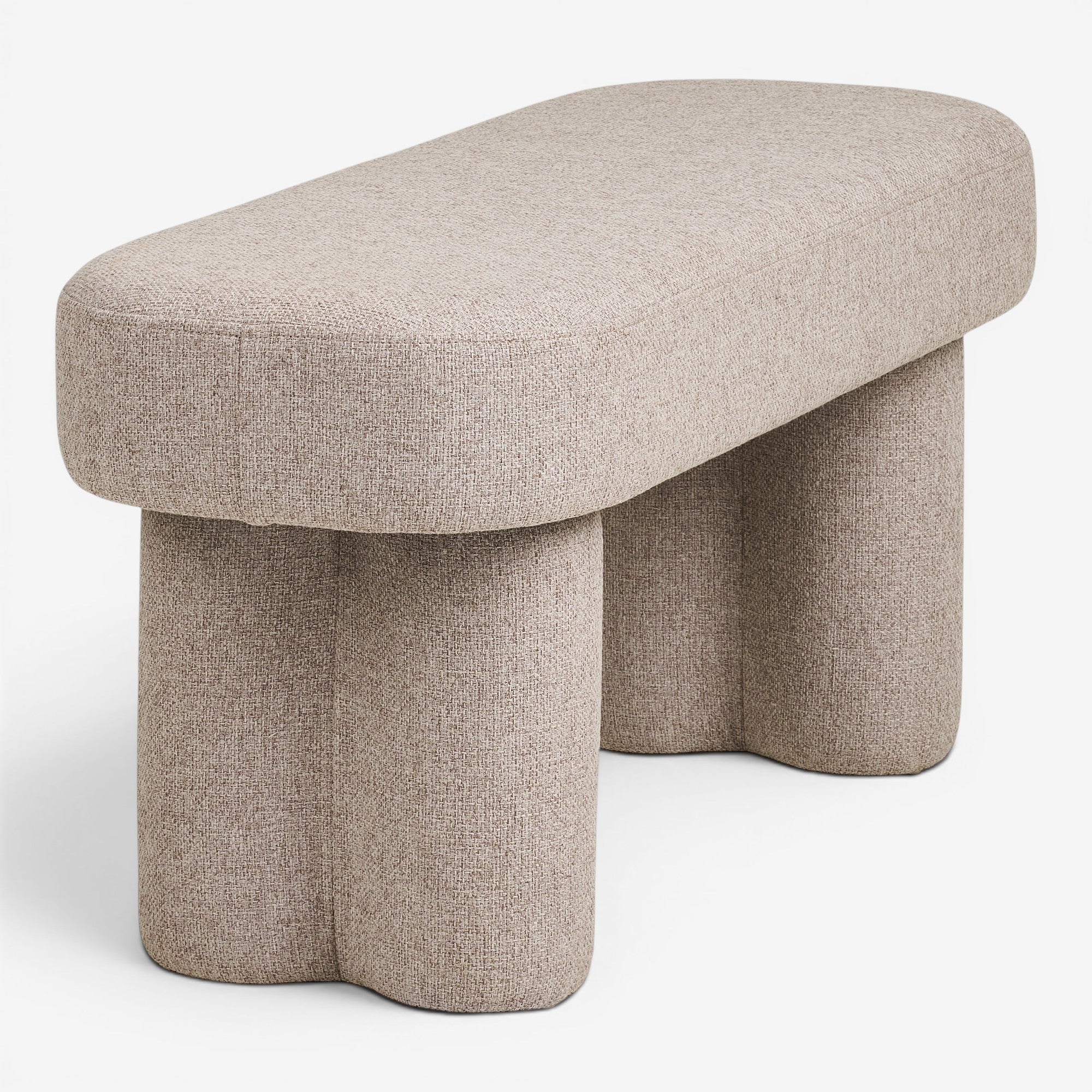 Kayu Living Weston Bench in sand tone upholstery with unique sculptural legs. Modern, minimalist design.