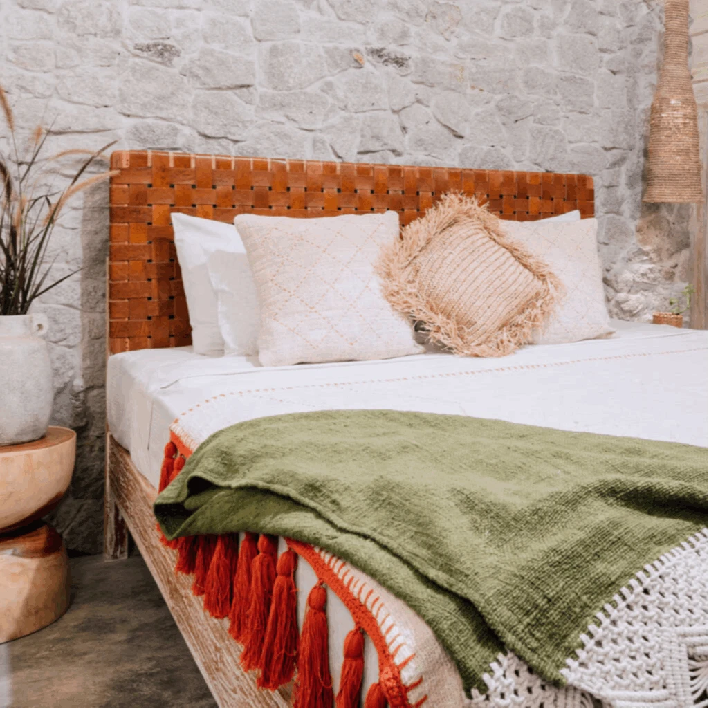 Kayu Living Sanur woven leather headboard with basketweave design in warm brown tones. Adds artisanal charm and texture.