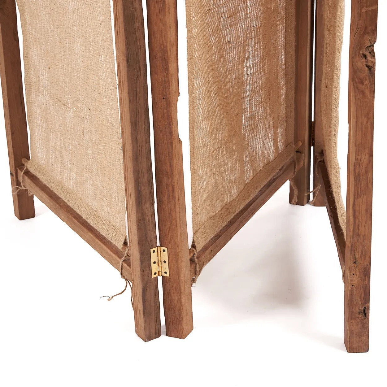 Kayu Living Zenbu room divider made from reclaimed teak wood and natural jute fabric panels with brass hinges.